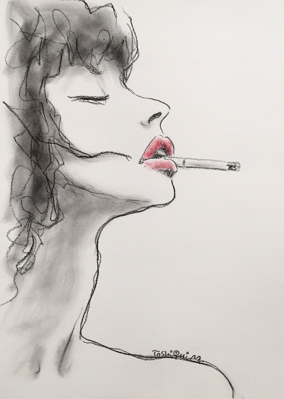 煙草を吸う女